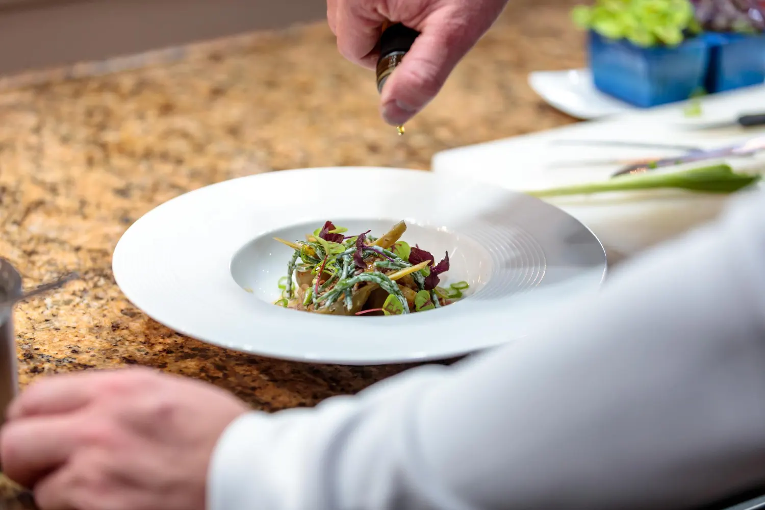 Private chef in Mykonos preparing a dining experience at a luxury villa
